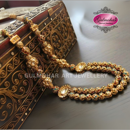 Handmade Pakistani Multani Kundan double layer ball mala featuring traditional Thappa Kundan work, semi-precious stones, and premium gold-plated finish. Perfect for bridal, wedding, Eid, and festive wear.