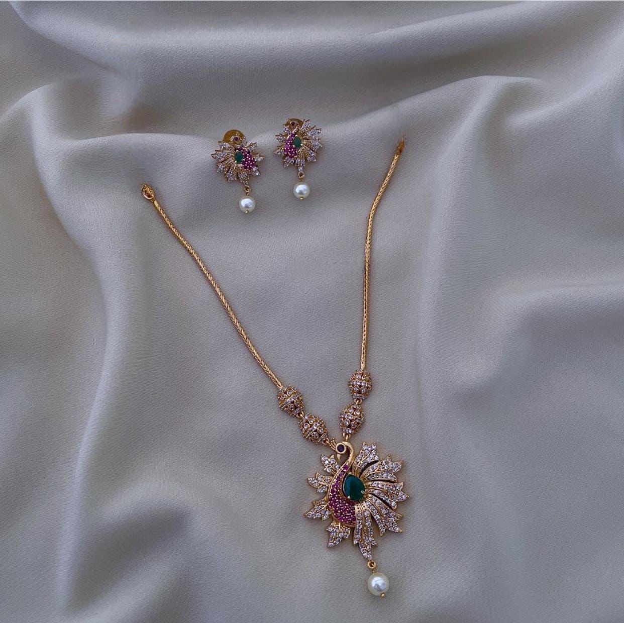 S-16: South Indian Peacock Pendant Set | CZ & AD Gold Plated