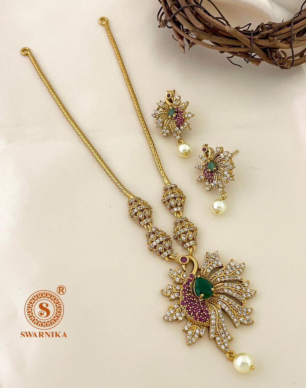 S-16: South Indian Peacock Pendant Set | CZ & AD Gold Plated