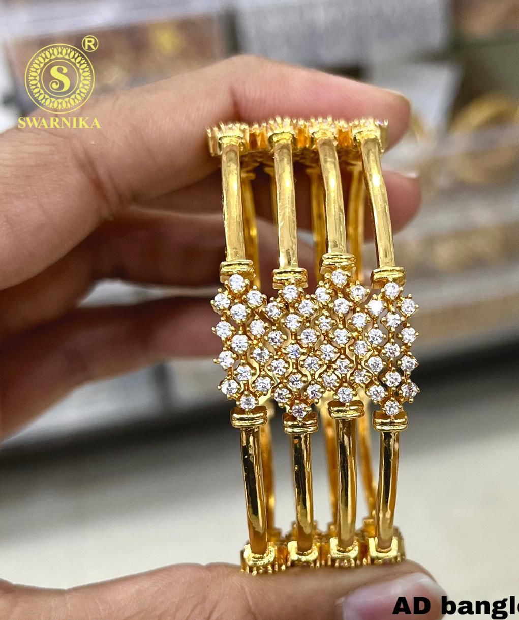 AD bangles
AD bangles set of 4
gold plated bangles
diamond bangles
American diamond bangles
AD stone bangles
gold bangles for women
party wear bangles
wedding bangles
bridal bangles
Pakistani jewellery bangles
formal wear bangles
designer bangles
statement bangles
diamond look bangles
gold plated jewellery
Gulmohar banglesbg-