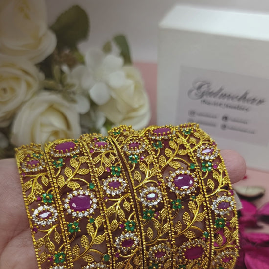 Nageen bangles, Nageen bangle set, AD bangles, CZ bangles, gold plated bangles, South Indian bangles, South Indian jewellery, floral bangles, floral design bangles, 6 piece bangle set, gold plated bangle set, AD CZ bangles, traditional bangles, bridal bangles, wedding bangles, party wear bangles, Pakistani jewellery, Indian jewellery, designer bangles, broad kara bangles, sleek bangles, traditional gold bangles, festive bangles