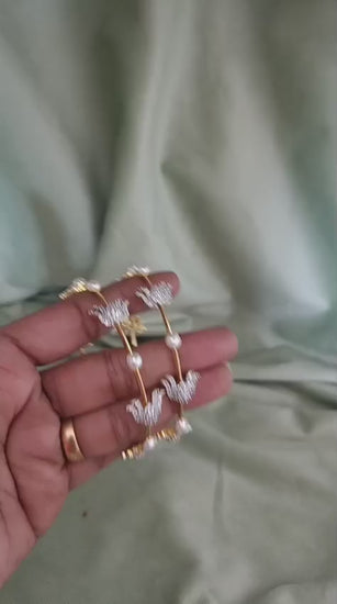 Lotus bangles, Lotus bangle set, CZ pearl bangles, CZ bangles, pearl bangles, gold plated bangles, rhodium plated bangles, dual tone bangles, South Indian bangles, South Indian jewellery, floral bangles, floral design bangles, 2 piece bangle set, sleek bangles, traditional bangles, designer bangles, bridal bangles, wedding bangles, party wear bangles, festive bangles, gold and rhodium bangles, CZ pearl jewellery, Indian bangles, Pakistani jewellery